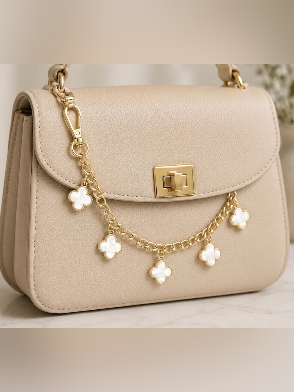 Van Cleef purse charm in gold